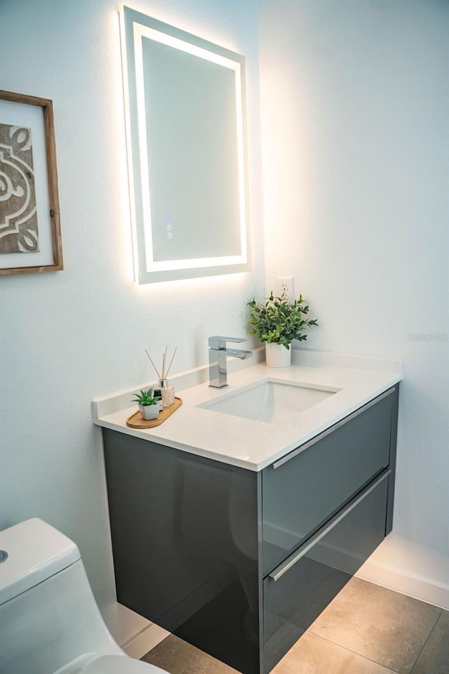 2124 Clematis Pl, Sarasota, FL 34239 - half bath featuring vanity and tile patterned flooring