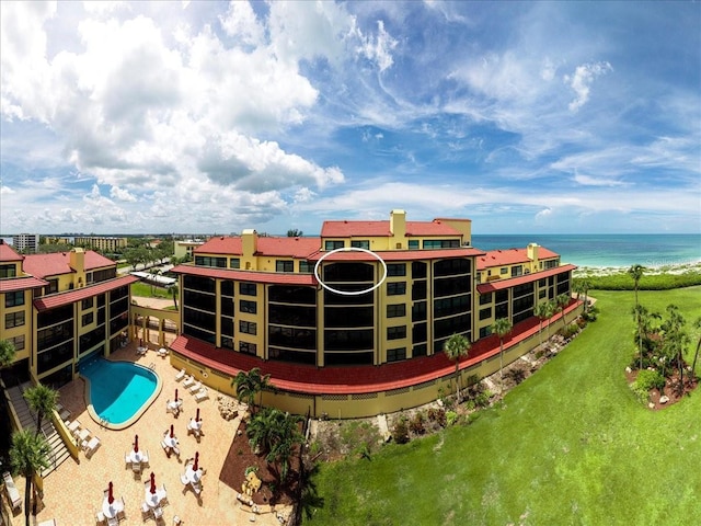8750 Midnight Pass Rd Unit 501, Sarasota, FL 34242 - view of building exterior featuring a water view