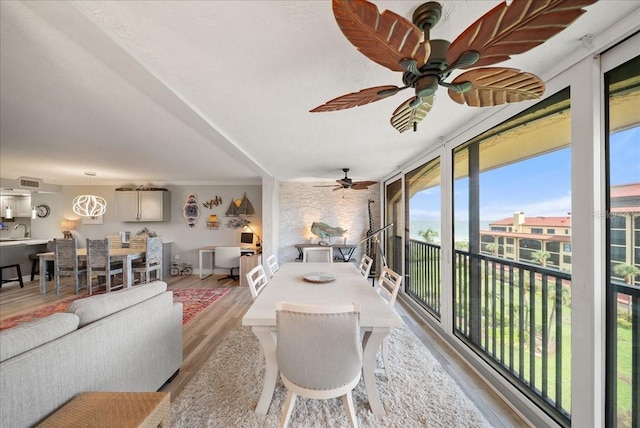 8750 Midnight Pass Rd Unit 501, Sarasota, FL 34242 - sunroom with a sink