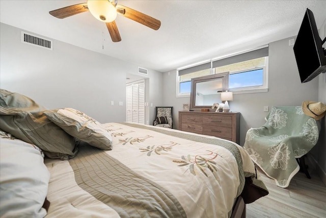 8750 Midnight Pass Rd Unit 501, Sarasota, FL 34242 - bedroom featuring wood finished floors and ceiling fan
