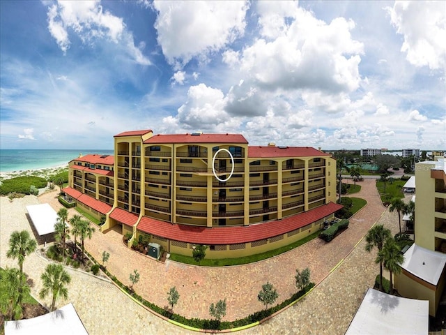 8750 Midnight Pass Rd Unit 501, Sarasota, FL 34242 - view of building exterior with a water view