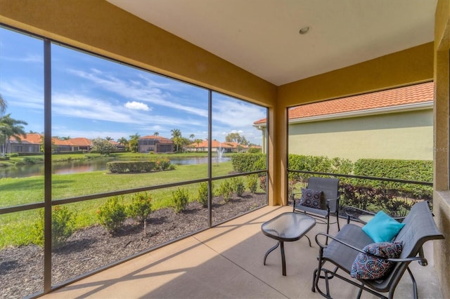 5179 Cantabria Crst, Sarasota, FL 34238 - sunroom featuring a water view and a residential view
