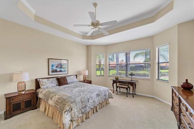 5179 Cantabria Crst, Sarasota, FL 34238 - bedroom featuring light colored carpet, a raised ceiling, ornamental molding, and a ceiling fan