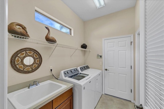 5179 Cantabria Crst, Sarasota, FL 34238 - laundry area with light tile patterned flooring and separate washer and dryer