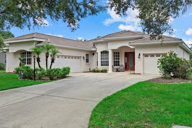 11508 30th Cv E, Parrish, FL 34219 - ranch-style house featuring an attached garage, concrete driveway, and a tile roof