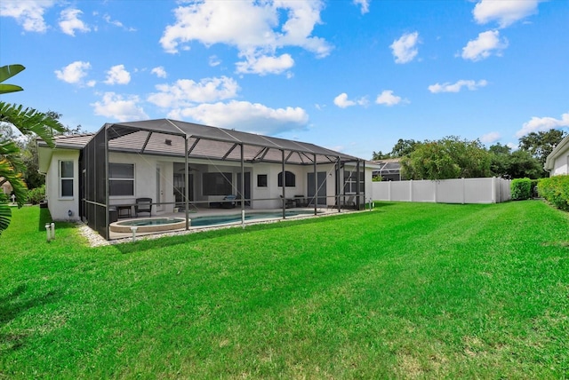 11508 30th Cv E, Parrish, FL 34219 - rear view of house with a lanai, stucco siding, a pool with connected hot tub, and a patio