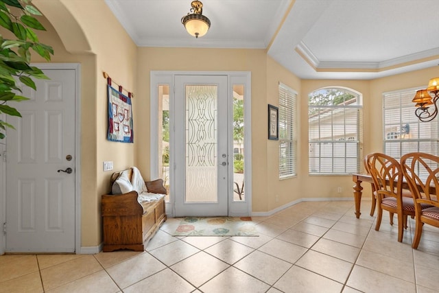 11508 30th Cv E, Parrish, FL 34219 - entrance foyer with crown molding, light tile patterned floors, and a chandelier
