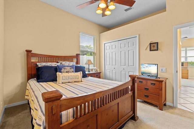 11508 30th Cv E, Parrish, FL 34219 - bedroom with a closet, light colored carpet, and ceiling fan