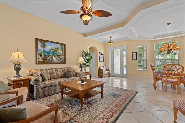11508 30th Cv E, Parrish, FL 34219 - living area with light tile patterned floors, arched walkways, a chandelier, and ceiling fan