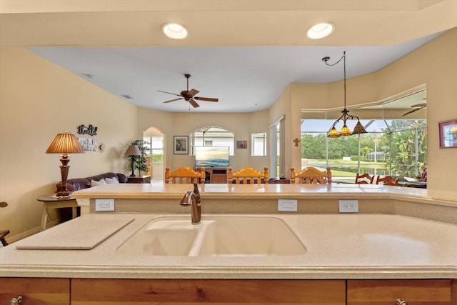 11508 30th Cv E, Parrish, FL 34219 - kitchen with open floor plan, light countertops, hanging light fixtures, and recessed lighting