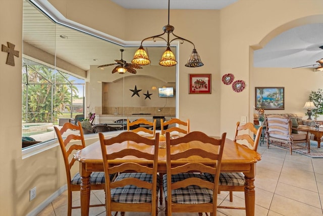 11508 30th Cv E, Parrish, FL 34219 - tiled dining area with a ceiling fan and arched walkways