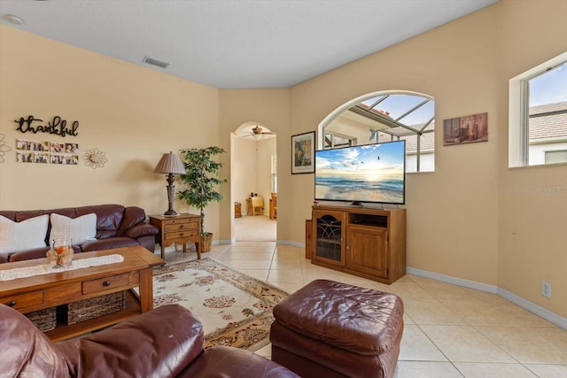 11508 30th Cv E, Parrish, FL 34219 - living area featuring light tile patterned floors and baseboards