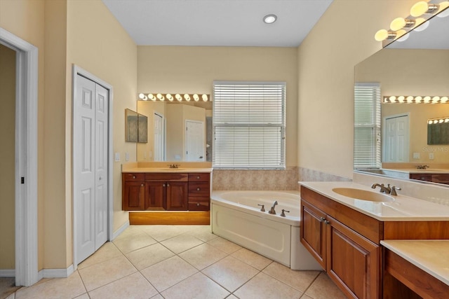 11508 30th Cv E, Parrish, FL 34219 - full bath featuring tile patterned flooring, a bath, and two vanities