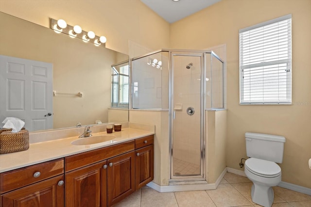 11508 30th Cv E, Parrish, FL 34219 - full bathroom with vanity, a shower stall, healthy amount of natural light, and tile patterned floors