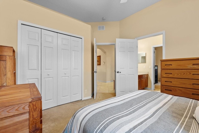 11508 30th Cv E, Parrish, FL 34219 - bedroom featuring a closet, light colored carpet, and ceiling fan