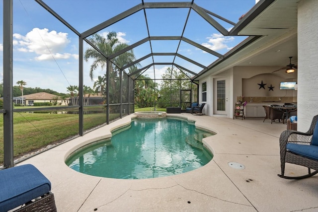 11508 30th Cv E, Parrish, FL 34219 - view of pool with a patio area, a yard, glass enclosure, a pool with connected hot tub, and a ceiling fan