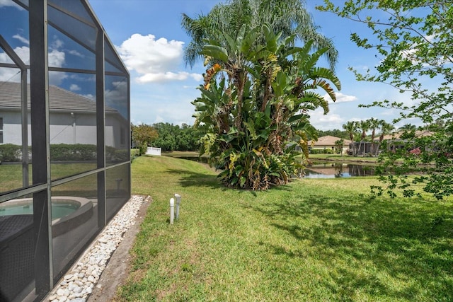 11508 30th Cv E, Parrish, FL 34219 - view of green lawn with a water view and glass enclosure