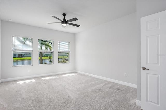 8706 Arrow Creek Dr, Parrish, FL 34219 - carpeted spare room with a ceiling fan and a smoke detector