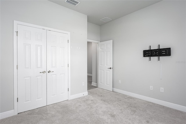 8706 Arrow Creek Dr, Parrish, FL 34219 - unfurnished bedroom featuring carpet flooring and a closet