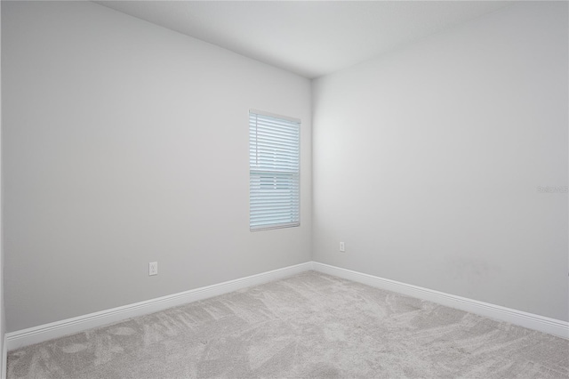 8706 Arrow Creek Dr, Parrish, FL 34219 - carpeted spare room featuring baseboards