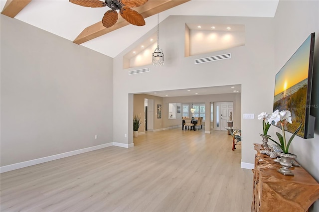 444 S Polk Dr, Sarasota, FL 34236 - living area with light wood-style floors, recessed lighting, beamed ceiling, ceiling fan, and high vaulted ceiling
