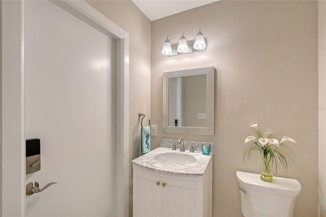 444 S Polk Dr, Sarasota, FL 34236 - half bathroom with toilet and vanity