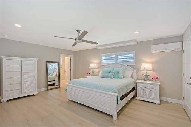 444 S Polk Dr, Sarasota, FL 34236 - bedroom with a wall unit AC, light wood-type flooring, ceiling fan, and recessed lighting