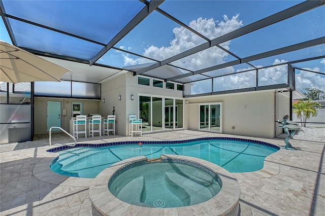 444 S Polk Dr, Sarasota, FL 34236 - view of pool with a patio area, a pool with connected hot tub, and a lanai