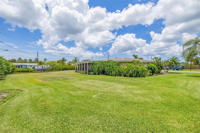 336 Highland Shores Dr, Ellenton, FL 34222 - view of grassy yard featuring a sunroom
