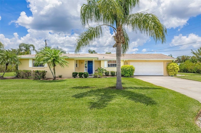 336 Highland Shores Dr, Ellenton, FL 34222 - ranch-style home featuring driveway, an attached garage, and a front lawn