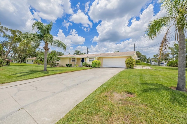 336 Highland Shores Dr, Ellenton, FL 34222 - single story home with driveway, a garage, and a front yard
