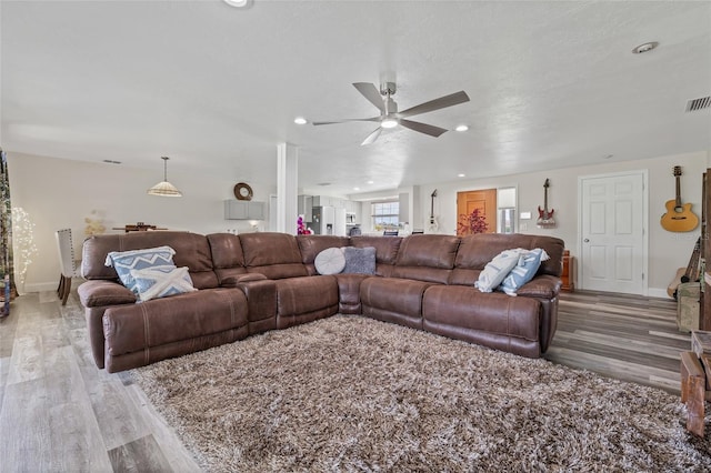 336 Highland Shores Dr, Ellenton, FL 34222 - living room featuring wood finished floors, a ceiling fan, and recessed lighting