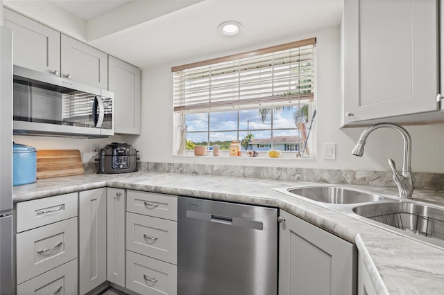 336 Highland Shores Dr, Ellenton, FL 34222 - kitchen with appliances with stainless steel finishes, light countertops, white cabinetry, and recessed lighting