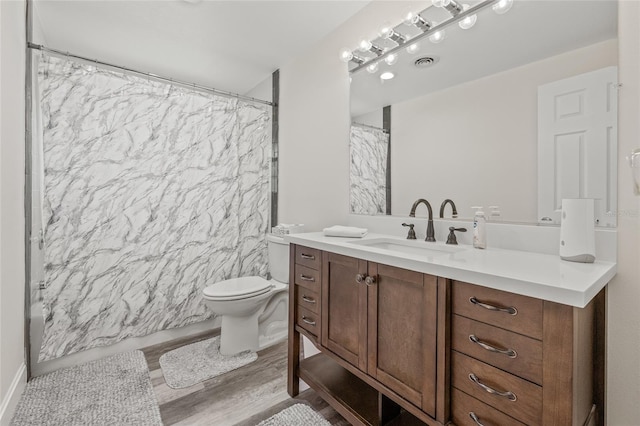 336 Highland Shores Dr, Ellenton, FL 34222 - full bathroom with vanity, wood finished floors, and curtained shower