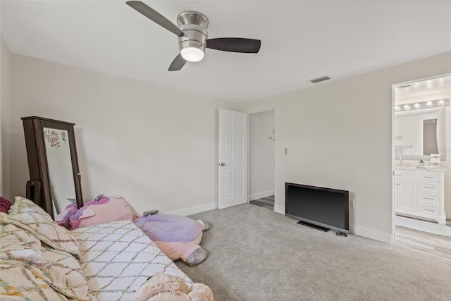 336 Highland Shores Dr, Ellenton, FL 34222 - bedroom featuring carpet, ensuite bath, and a ceiling fan
