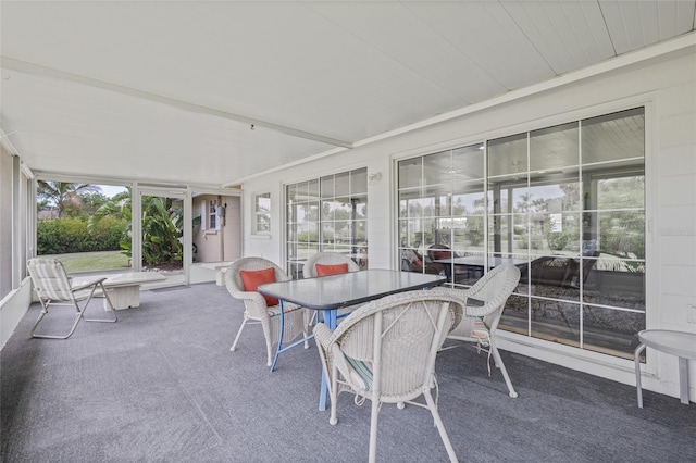 336 Highland Shores Dr, Ellenton, FL 34222 - sunroom with healthy amount of natural light, carpet flooring, and outdoor dining area