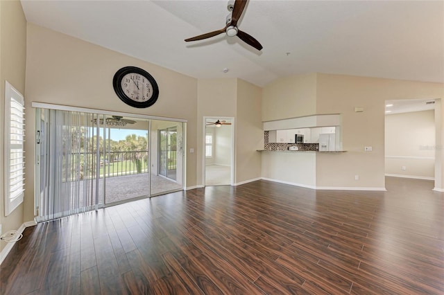 803 Montrose Dr Unit 201, Venice, FL 34293 - unfurnished living room with ceiling fan, high vaulted ceiling, and dark wood-type flooring