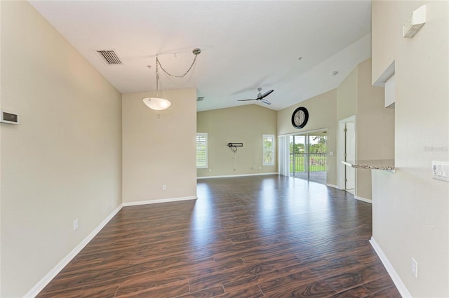 803 Montrose Dr Unit 201, Venice, FL 34293 - unfurnished room with ceiling fan, dark wood-style floors, and high vaulted ceiling