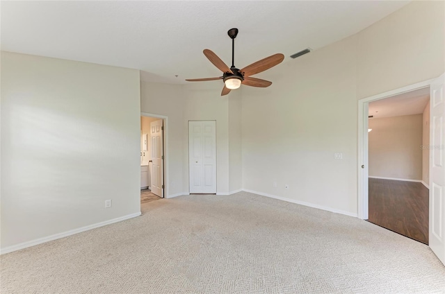 803 Montrose Dr Unit 201, Venice, FL 34293 - empty room with carpet flooring and a ceiling fan