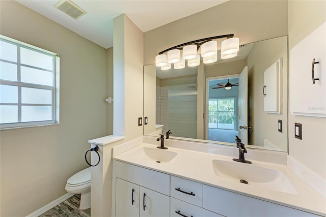 803 Montrose Dr Unit 201, Venice, FL 34293 - bathroom featuring double vanity and a ceiling fan