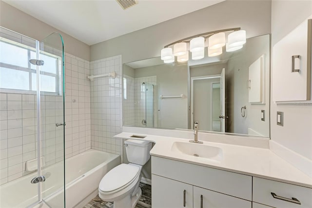 803 Montrose Dr Unit 201, Venice, FL 34293 - bathroom with bath / shower combo with glass door and vanity