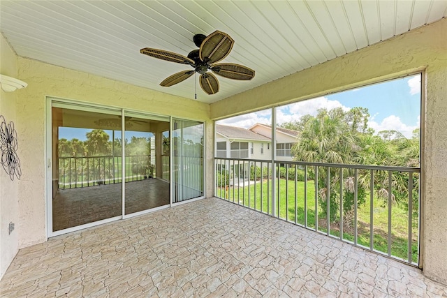 803 Montrose Dr Unit 201, Venice, FL 34293 - unfurnished sunroom featuring ceiling fan