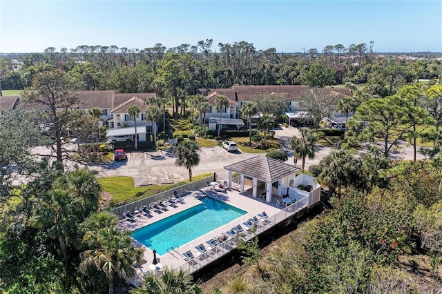 803 Montrose Dr Unit 201, Venice, FL 34293 - drone / aerial view of a pool and a tree filled landscape