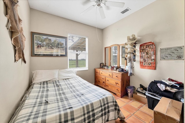 39700 State Road 70 E, Myakka City, FL 34251 - bedroom with light tile patterned flooring and a ceiling fan