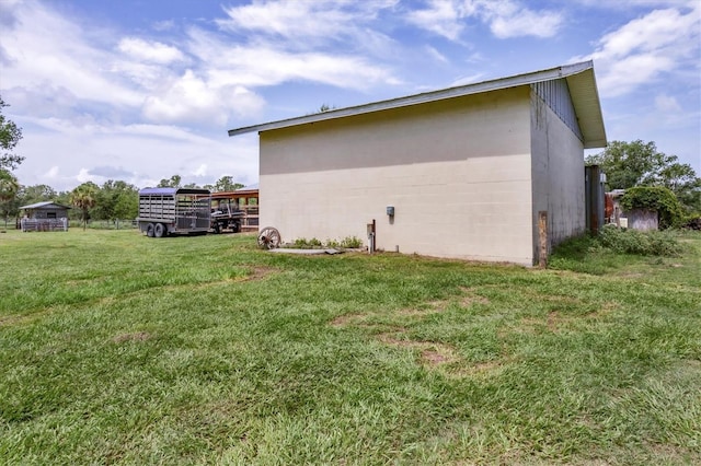 39700 State Road 70 E, Myakka City, FL 34251 - view of home's exterior featuring a lawn and concrete block siding