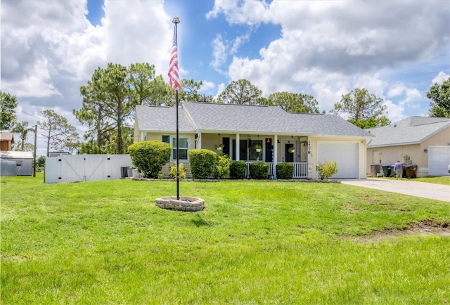1778 N Salford Blvd, North Port, FL 34286 - ranch-style home with a gate, concrete driveway, a garage, and a shingled roof