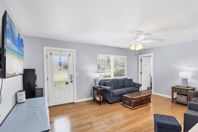 1778 N Salford Blvd, North Port, FL 34286 - living room featuring light wood finished floors and ceiling fan