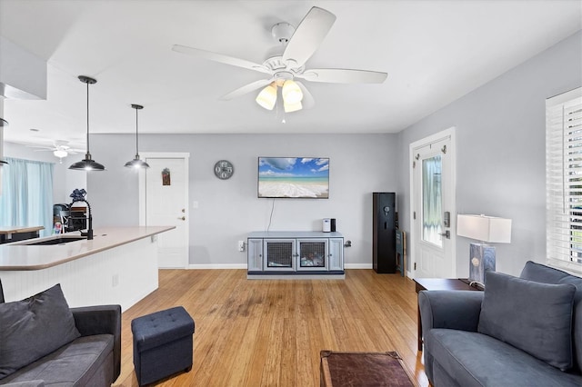 1778 N Salford Blvd, North Port, FL 34286 - living area featuring a ceiling fan and light wood finished floors