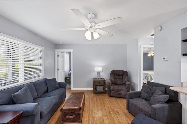 1778 N Salford Blvd, North Port, FL 34286 - living room featuring a ceiling fan and light wood finished floors