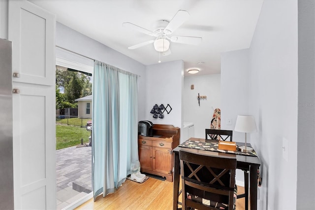 1778 N Salford Blvd, North Port, FL 34286 - dining area featuring ceiling fan, light wood finished floors, and washer / clothes dryer